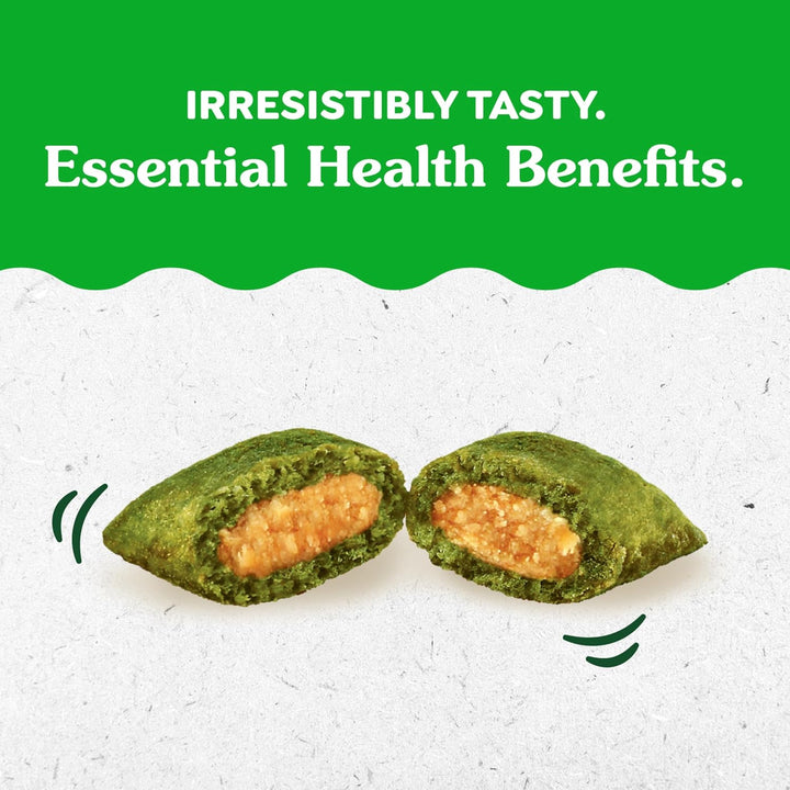 Green cookie with a filling on a textured white surface, text about taste and health benefits on a green background. Greenies Feline Smartbites Healthy Indoor Cat Treats, Tuna Flavor