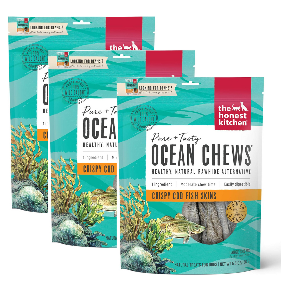 Three packages of 'The Honest Kitchen' Ocean Chews with ocean-themed design. The Honest Kitchen Human Grade Ocean Chews Crispy Cod Fish Skins, 5.5 Ounces- 3 PACK