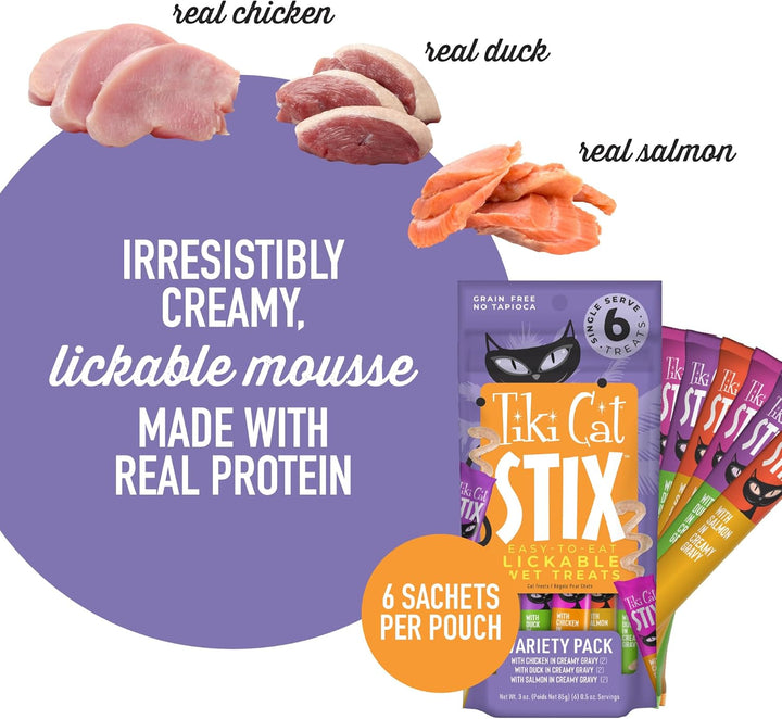 Tiki Cat Stix pet treats packaging with ingredients and product details on a white background. Tiki Cat Stix Mousse Treats, Variety Pack with Salmon, Chicken, and Duck