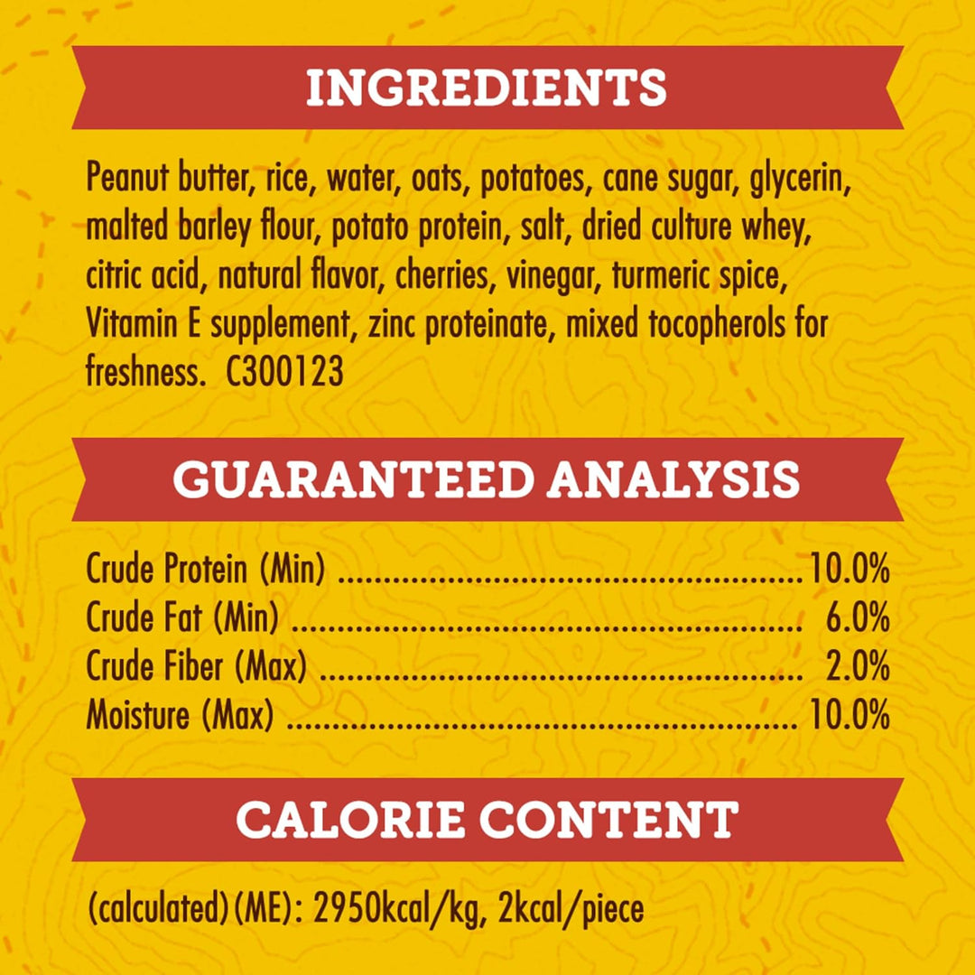 Nutritional label with ingredients, guaranteed analysis, and calorie content on a yellow background. Zuke's Mini Naturals Dog Treats Peanut Butter